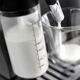 De'Longhi Magnifica Evo koffiemachine - melksysteem